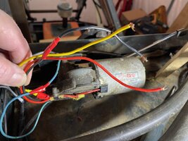 Yellow Red and Black wires from wiper motor left loose in upper cab.jpeg